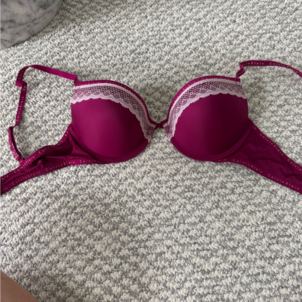 New with no tagsCalvin Klein Women's red  Lace Trim Bra 75c